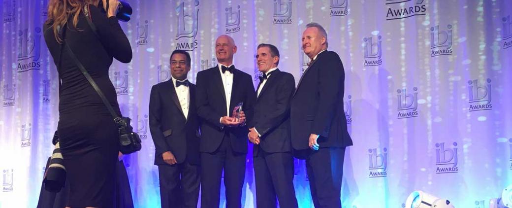 Peter Stewart and Olous Boag (centre) accept IBJ 2016 Ship of the Year Award at IBJ Gala event.