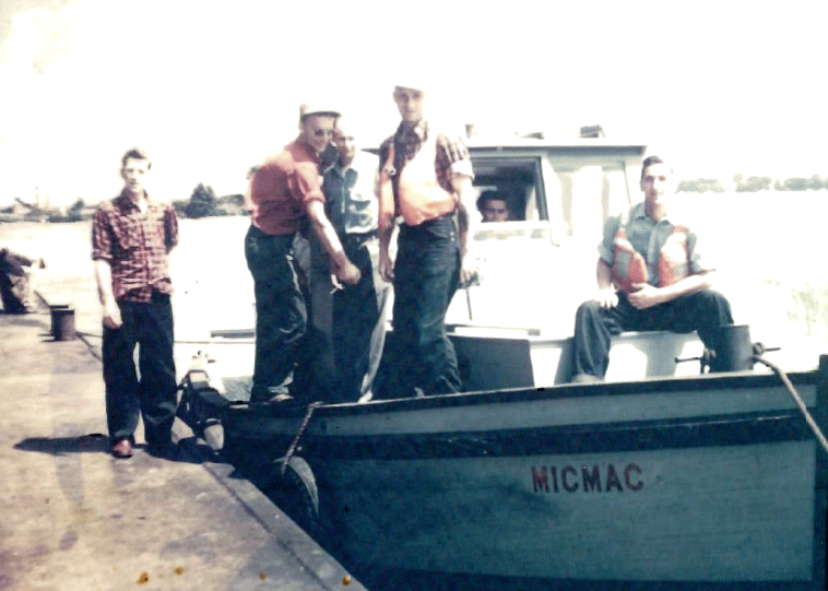 historic workboat on the Seaway with Evans Cutter and workers.